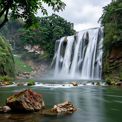 Majestic Waterfall in Lush Jungle