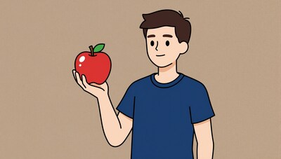 Man holding red apple