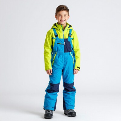 Boy in colorful ski suit