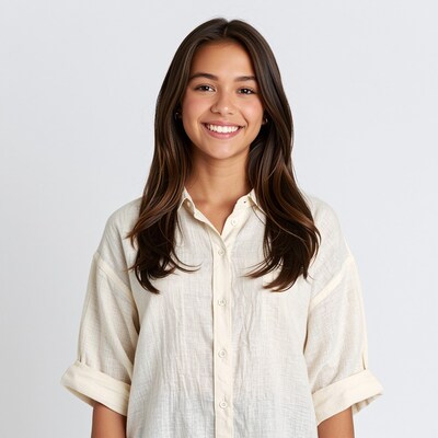 Smiling young woman with long brown hair