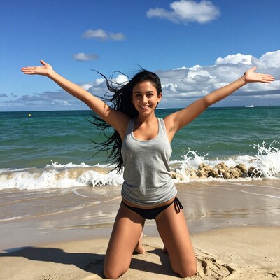 Happy woman on tropical beach