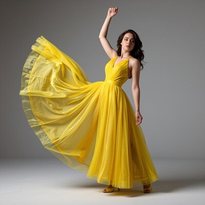 Woman in flowing yellow dress