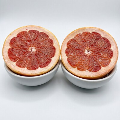 Halved Red Grapefruit in Bowls