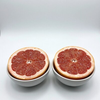 Halved Grapefruit in Bowls