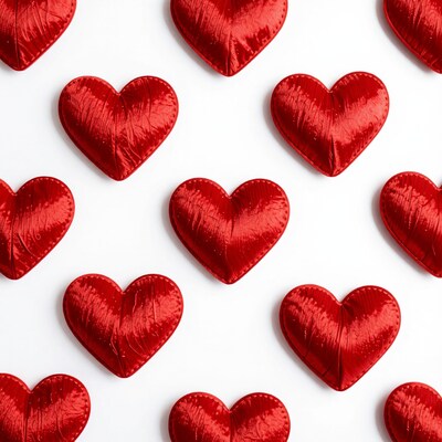 Red velvet hearts on white