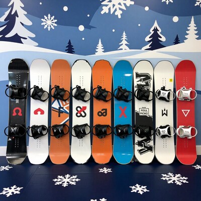 Nine Colorful Snowboards Lined Up