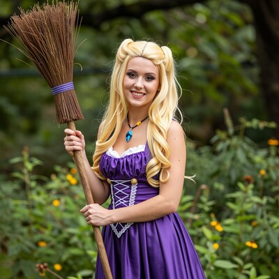 Blonde Woman in Purple Dress with Broom