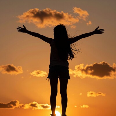 Girl silhouette at sunset