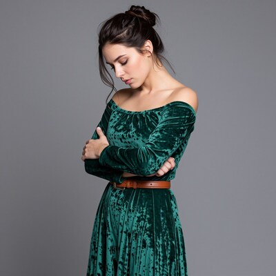 Woman in green velvet dress