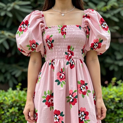 Woman in Pink Floral Puff Sleeve Dress