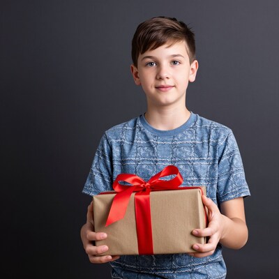 Boy holding gift box