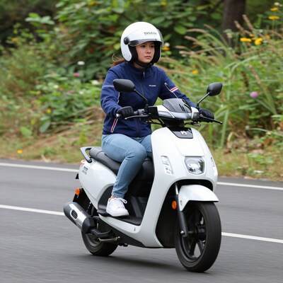Asian woman riding white scooter