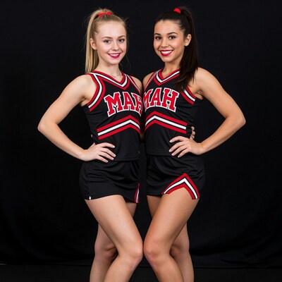 Two Cheerleader Girls Posing