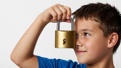 Boy Holding Padlock