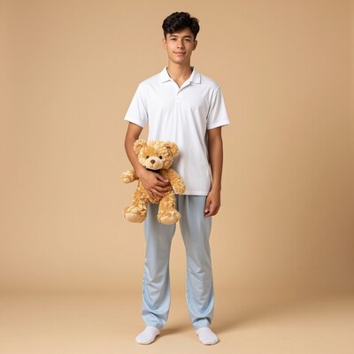Young man with teddy bear
