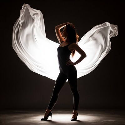 Woman with flowing white fabric