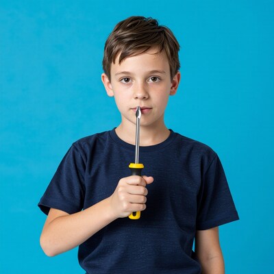 Boy holding screwdriver