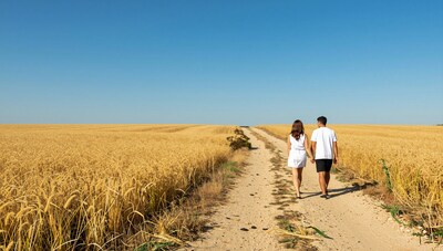Couple Walking in Wheat Field