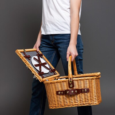Person holding picnic basket