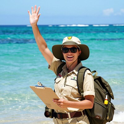 Female ranger waving on beach