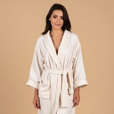 Woman in white bathrobe