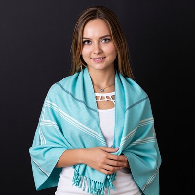 Woman in turquoise shawl
