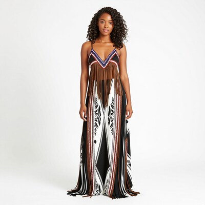 Woman in tribal fringe maxi dress