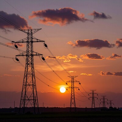 Electricity pylons at sunset