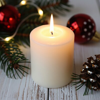 Lit Christmas candle