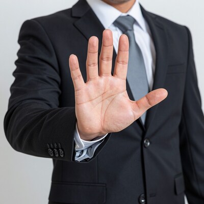 Man showing stop hand gesture
