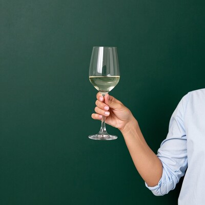 Woman holding wine glass