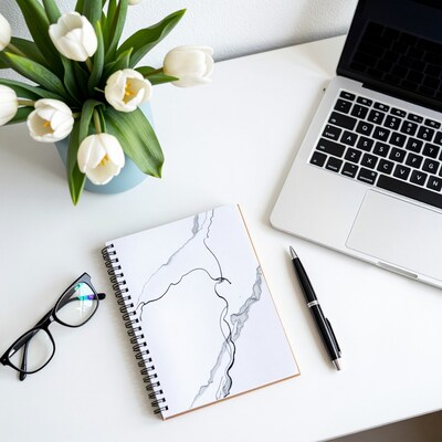 White Desk Setup with Notebook