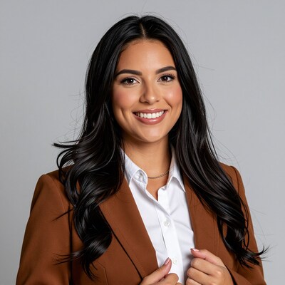 Smiling Latina woman in brown blazer