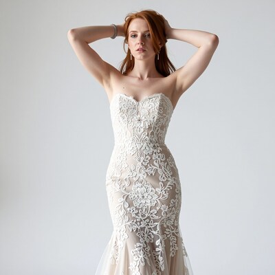 Redhead woman in white lace wedding dress