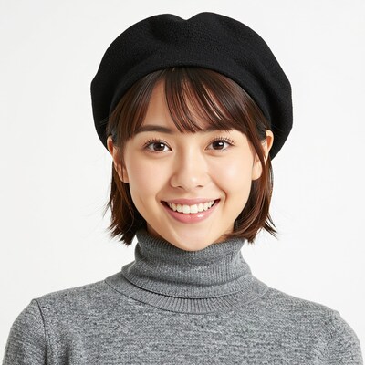 Smiling Asian woman in black beret