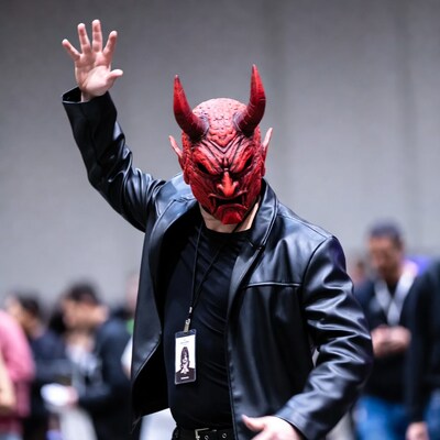 Man in red devil mask