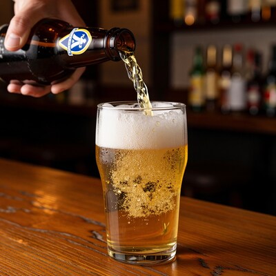 Pouring Beer into Glass