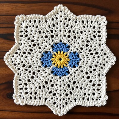 Crochet White Doily with Blue Yellow Flower