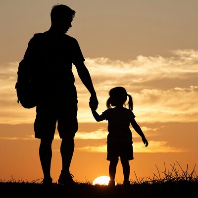 Father and Daughter Silhouette at Sunset