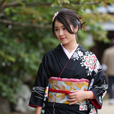 Young Japanese woman in black kimono