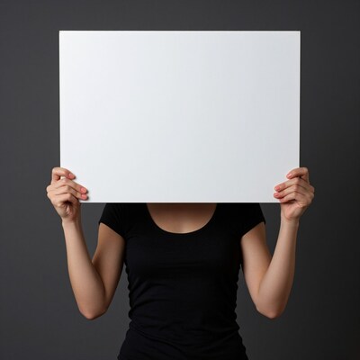 Woman holding blank sign
