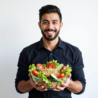Man holding healthy salad bowl