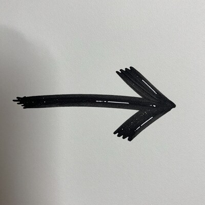 Black arrow pointing right