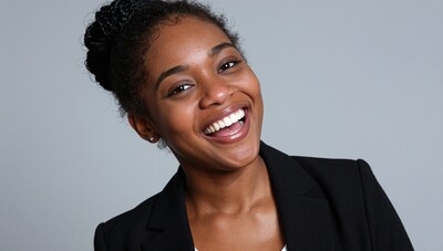 Smiling Black Woman in Blazer