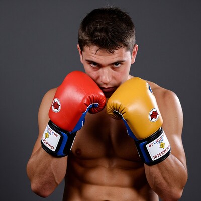 Boxer with red and yellow gloves