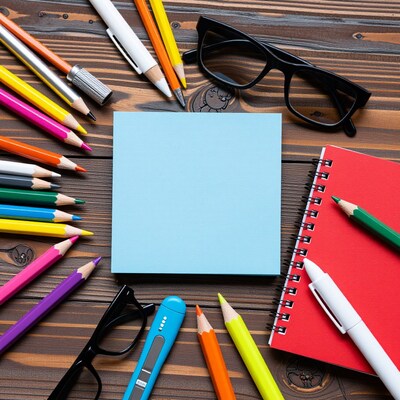 Colorful School Supplies on Wooden Desk